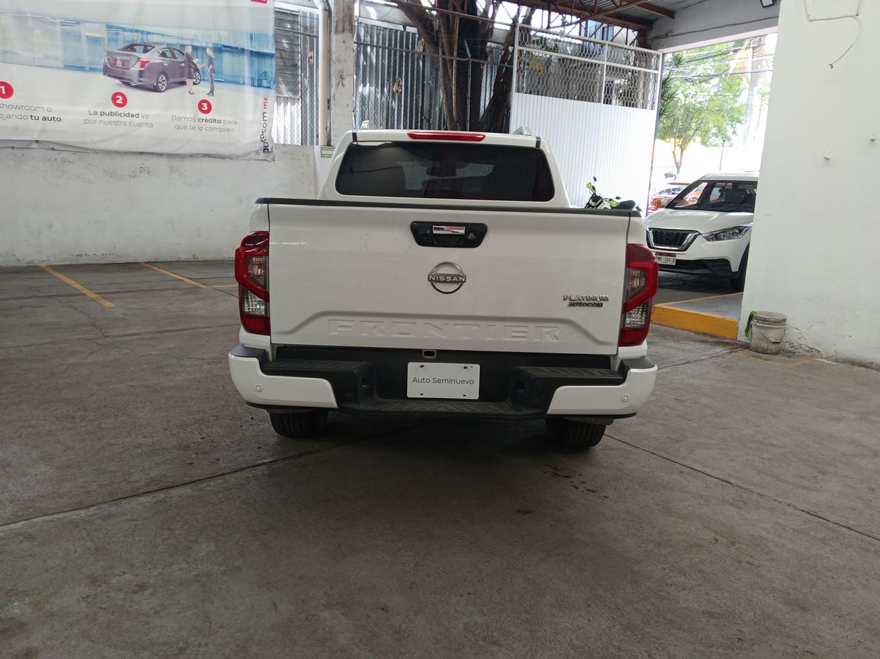 2023 Nissan FRONTIER PLATINUM LE TA 23